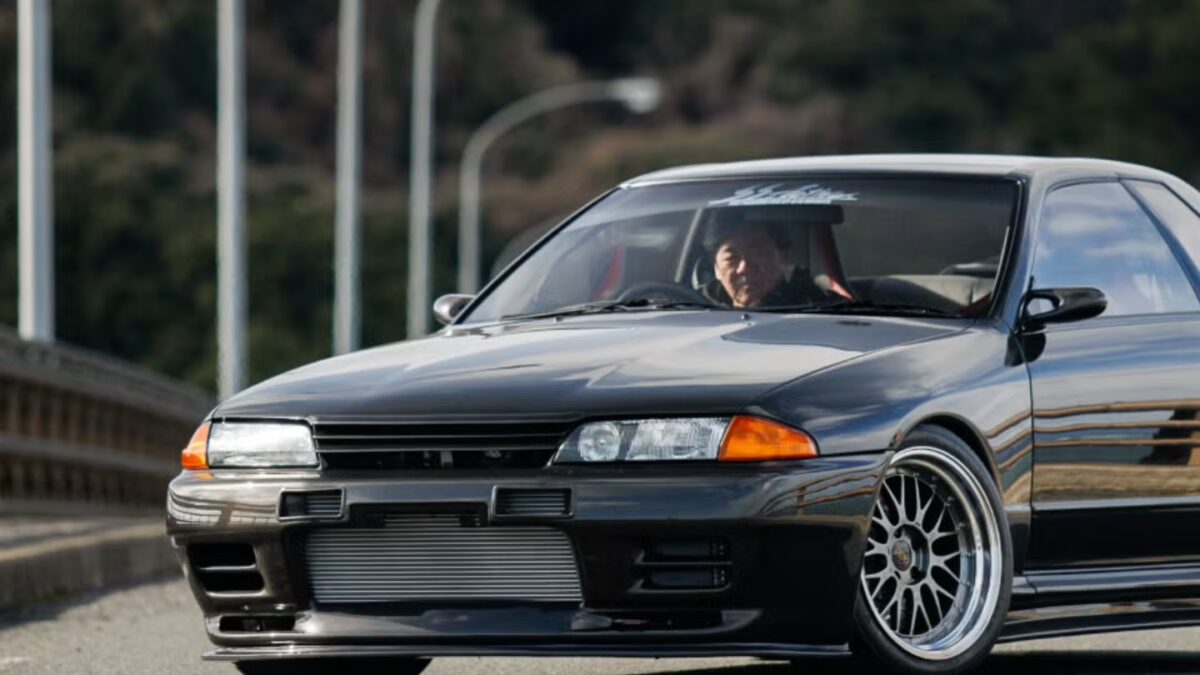 Garage Active's full dry carbon narrowbody Nissan Skyline R32 GT-R parked in Japan, showing the raw carbon fibre bodywork and narrow factory-width proportions of the $375,000 commission build.