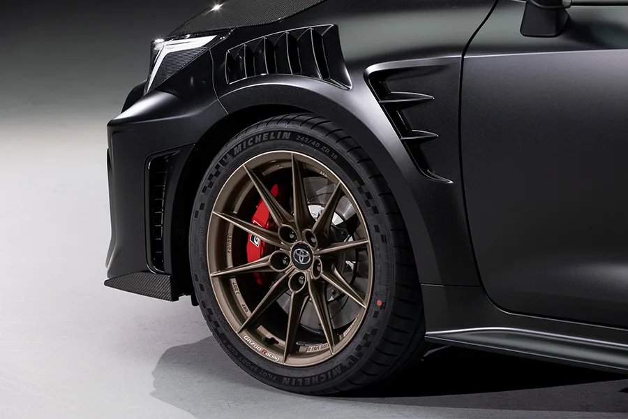 While the Rest of the Industry Wrings Its Hands About EVs, Toyota Has Just Built a 300hp Manual Hatchback With Two Seats and a Wing. 5 toyota grmn corolla 2026 front fender wheel