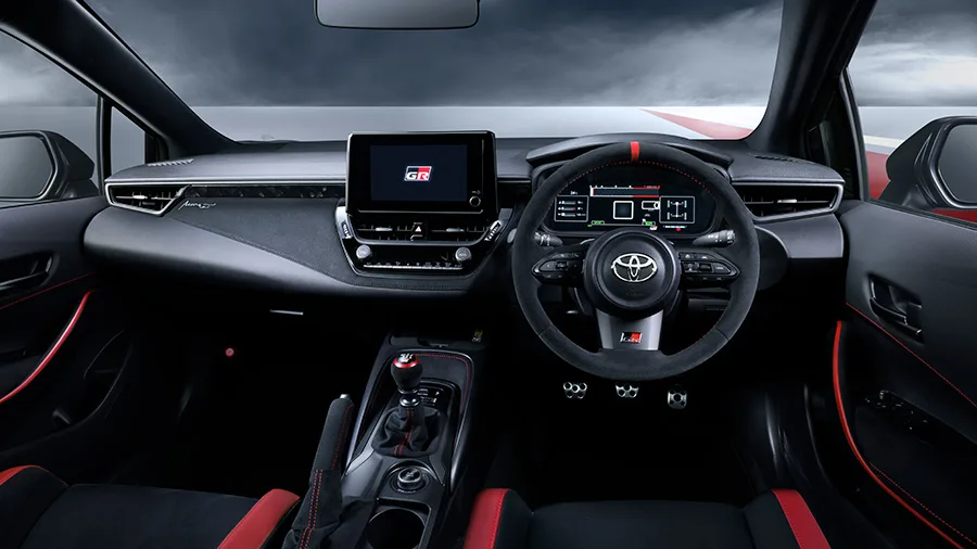 While the Rest of the Industry Wrings Its Hands About EVs, Toyota Has Just Built a 300hp Manual Hatchback With Two Seats and a Wing. 4 toyota grmn corolla 2026 interior